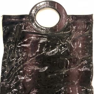 Multi functional Burgundy/black handbag clutch.